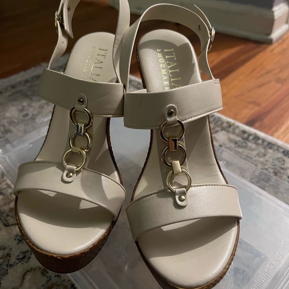 Beige and gold platforms. Brand new. Too high for me